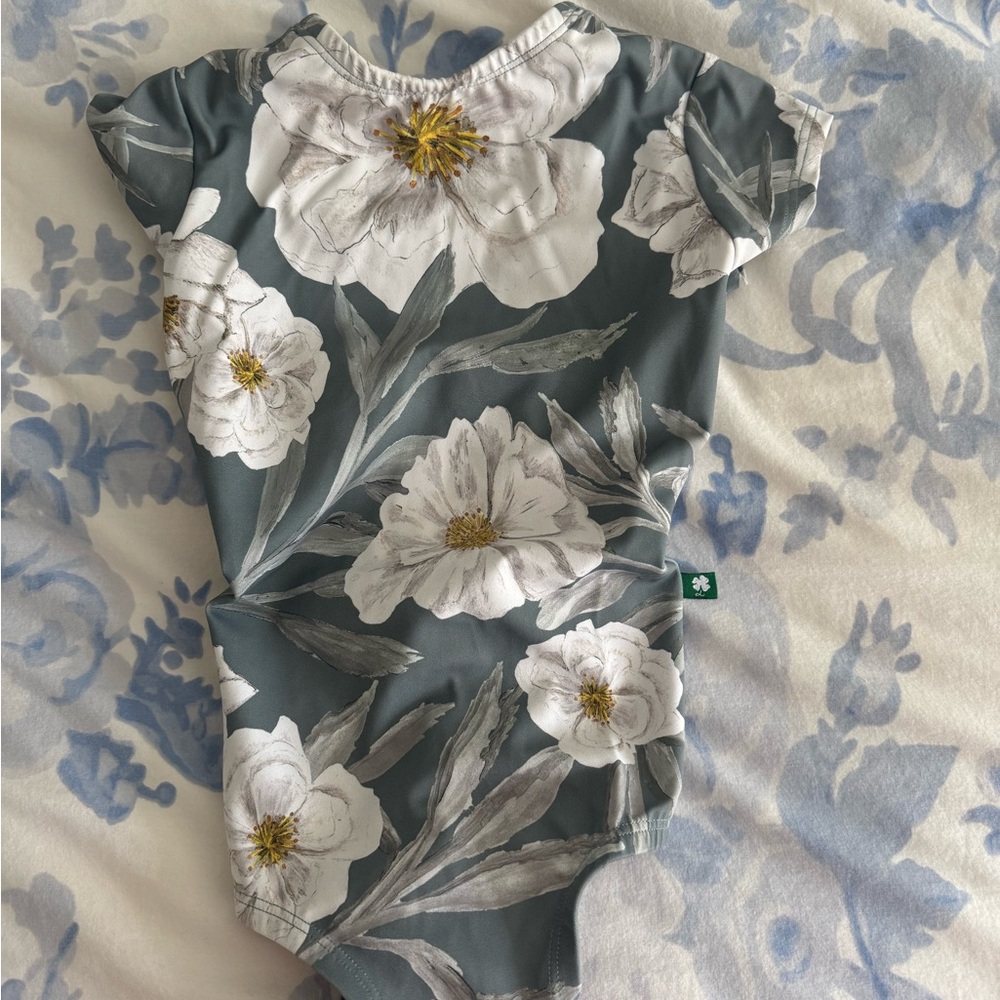Floral Lucky Leo leotard in Grayish Green and White